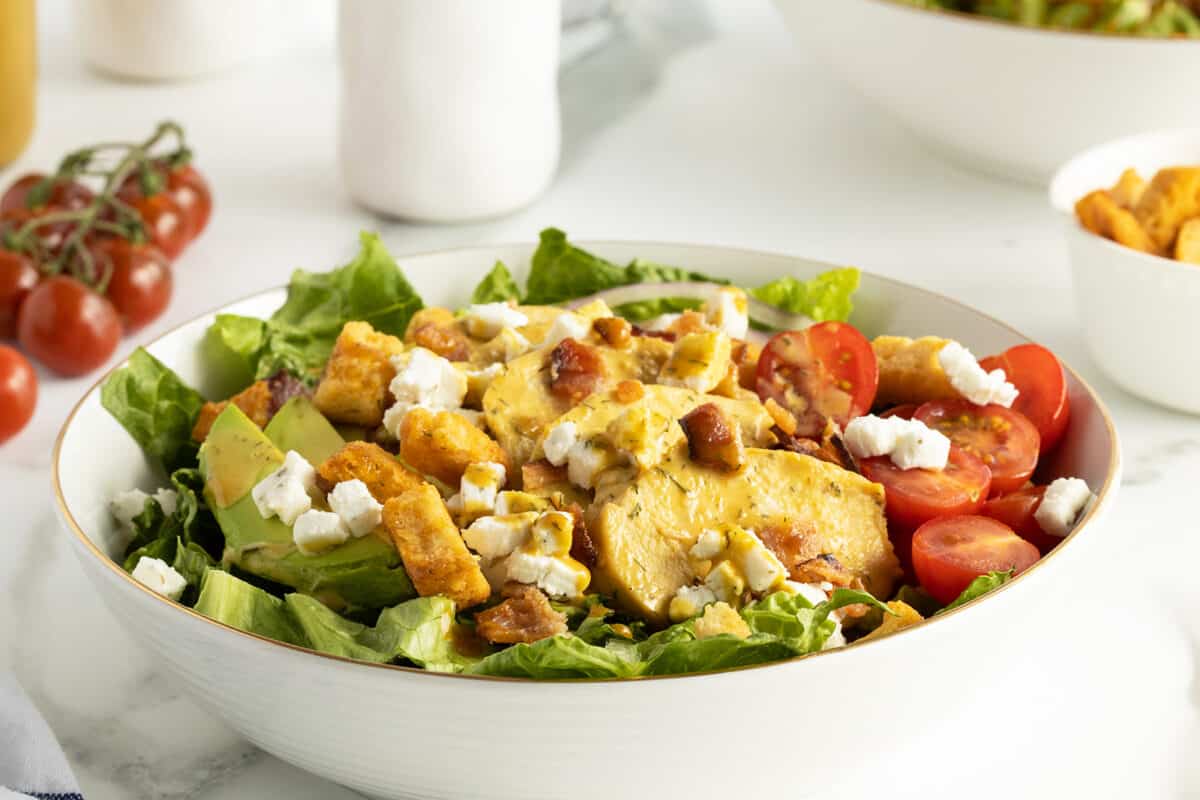 honey mustard chicken salad in a white bowl 