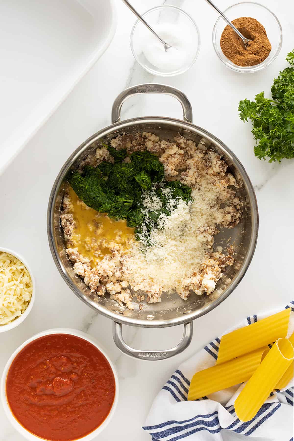 sausage stuffed manicotti ingredients in a pot un mixed