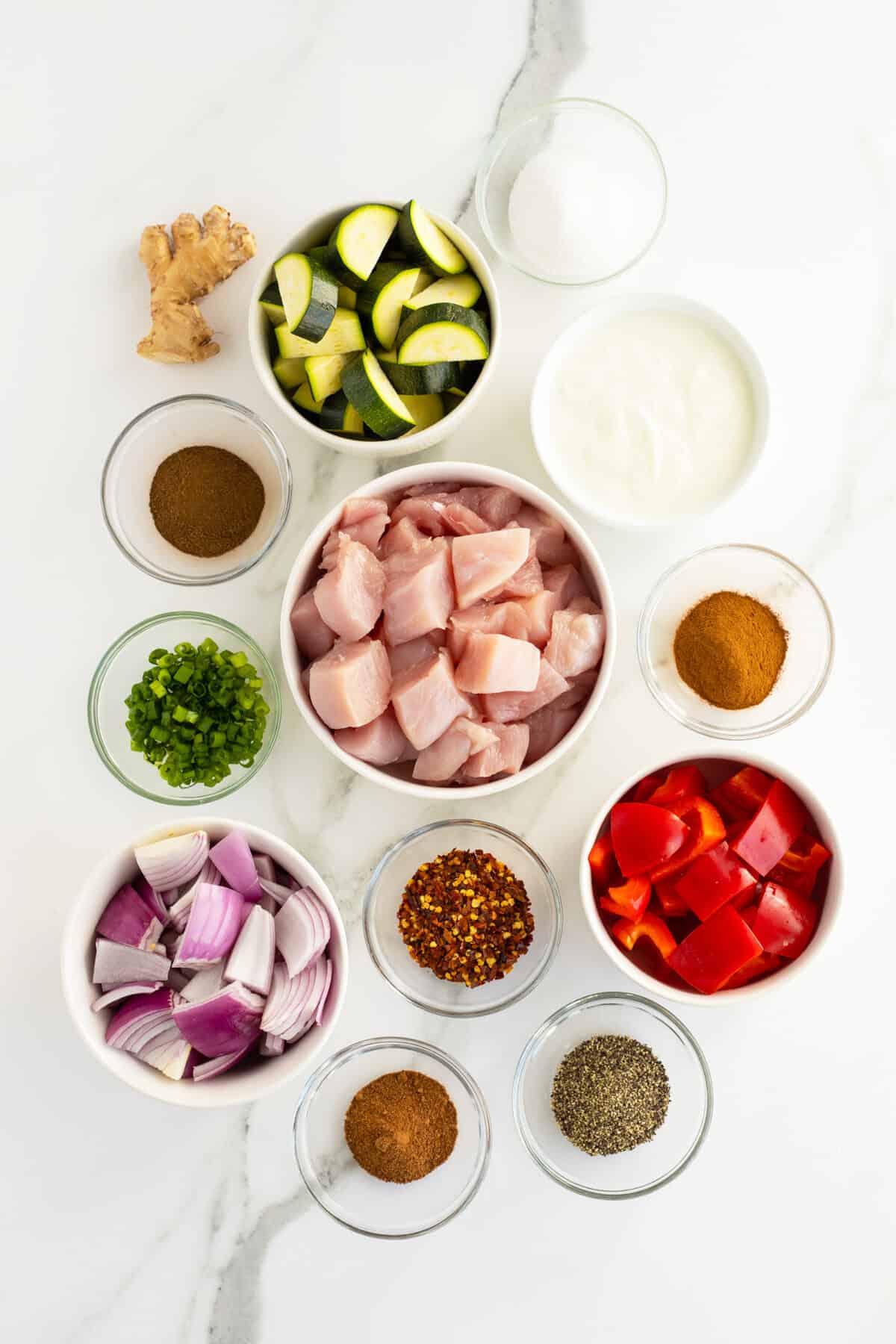 turkey kebabs ingredients in small clear bowls