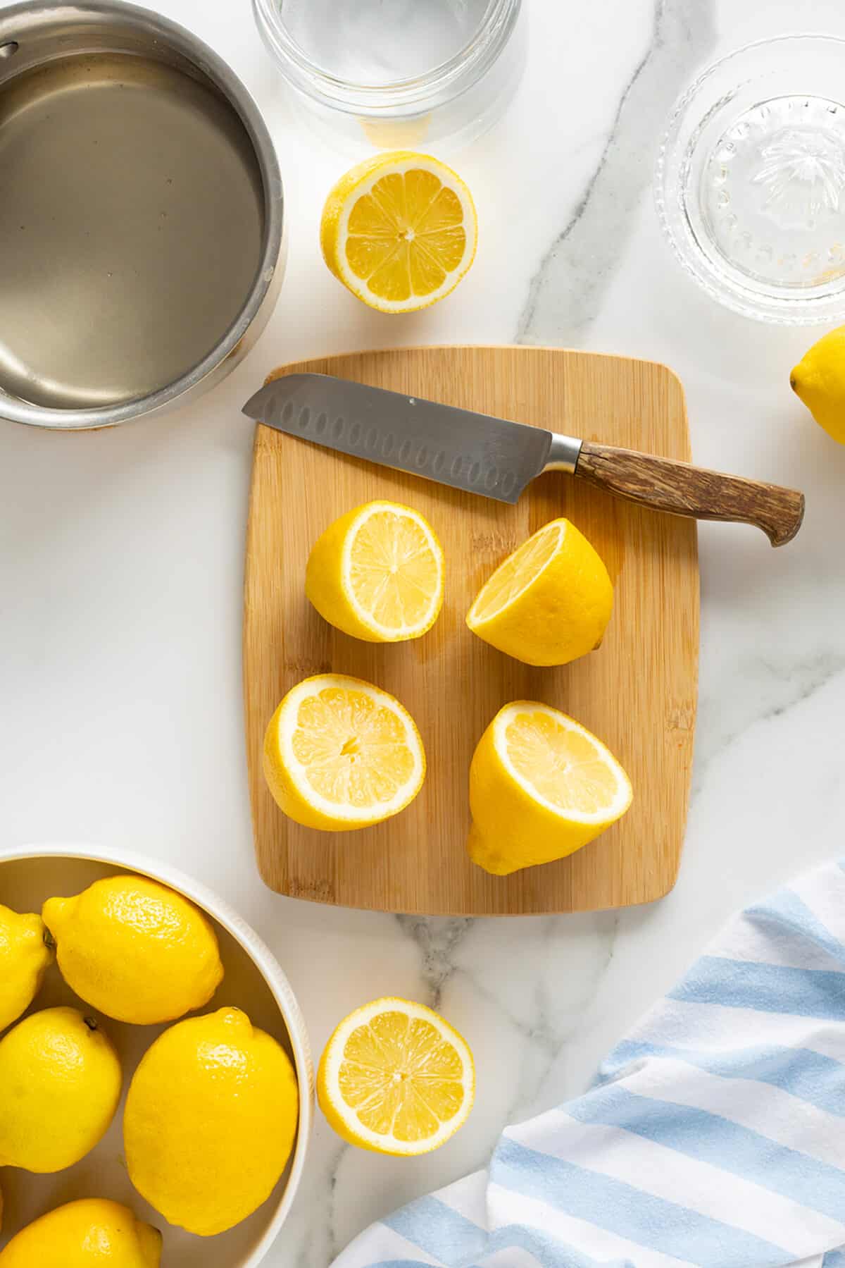 fresh lemonade lemons on cutting board sliced
