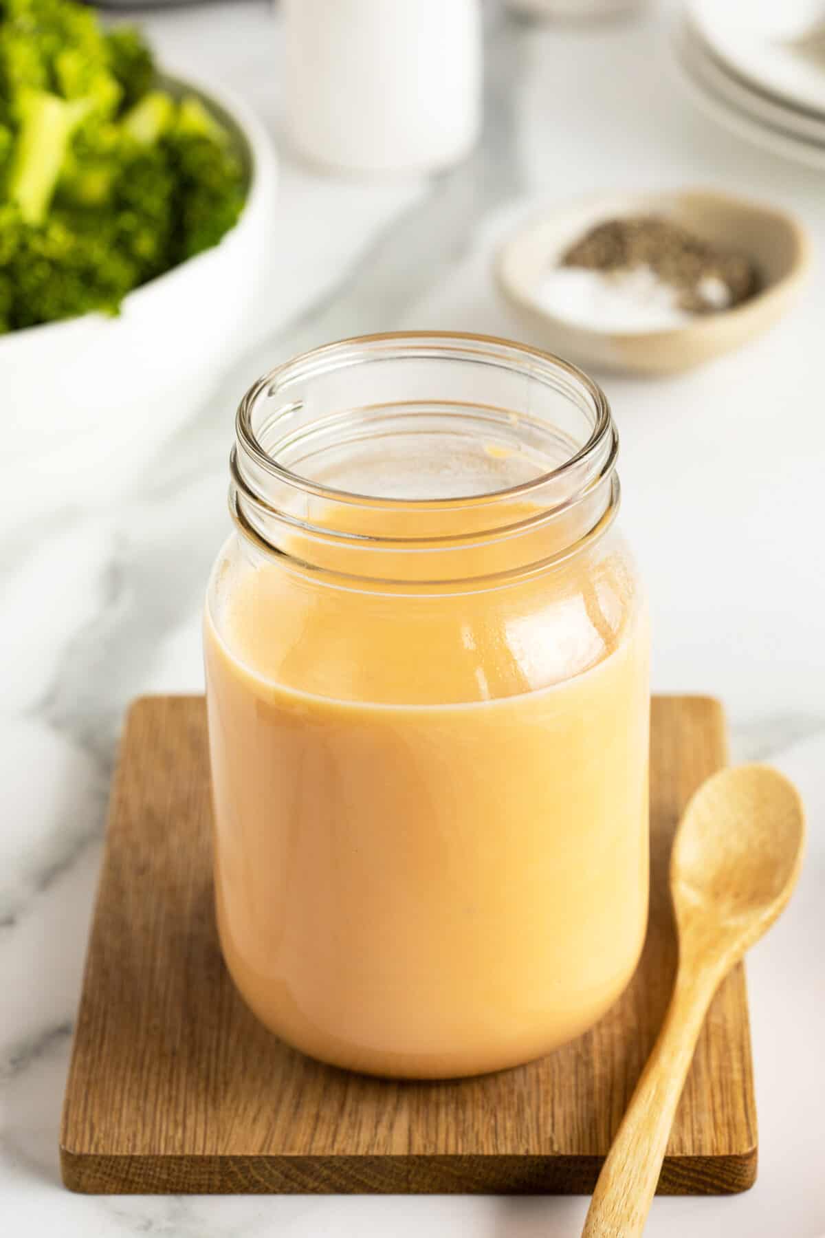 cheese sauce in a clear mason jar