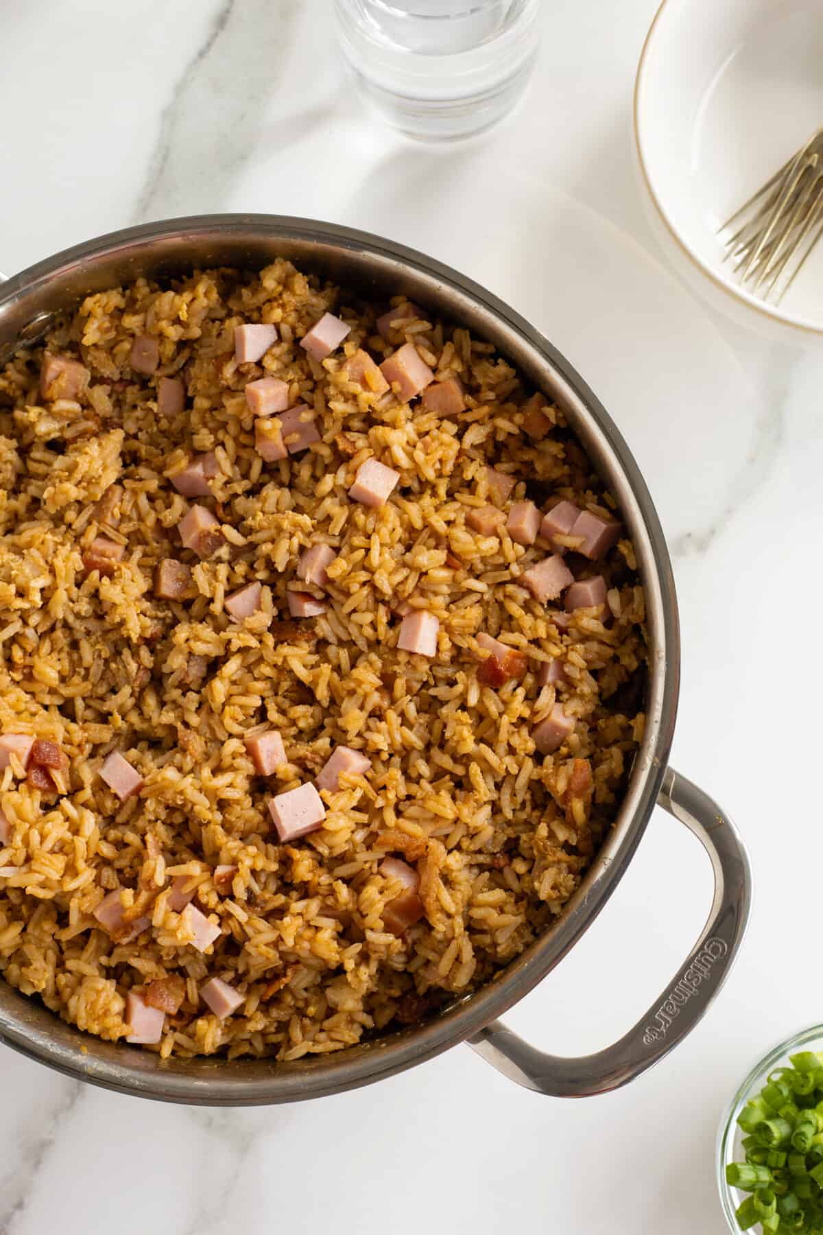 breakfast rice in a large stainless steel pot