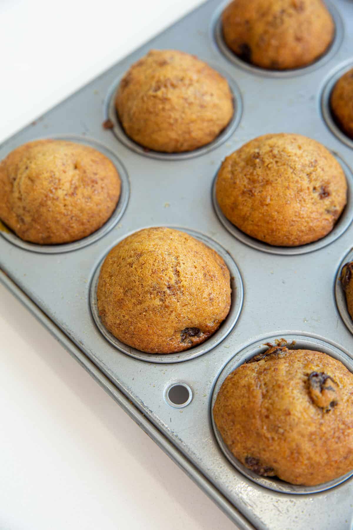 mini bran muffins in a muffin tin