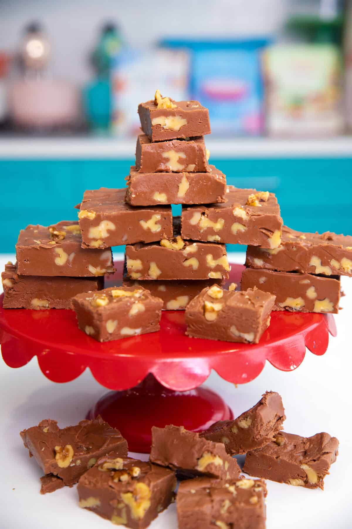 fantasy fudge in a stack on a red cake stand