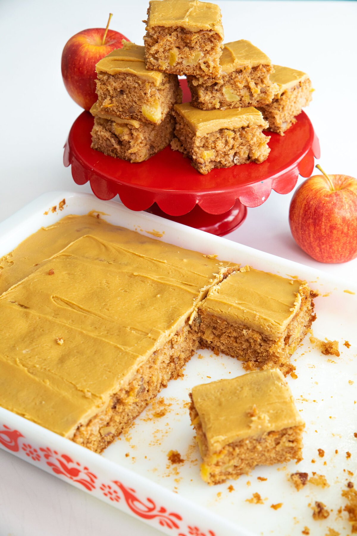 a pan of apple cake with icing glaze on top