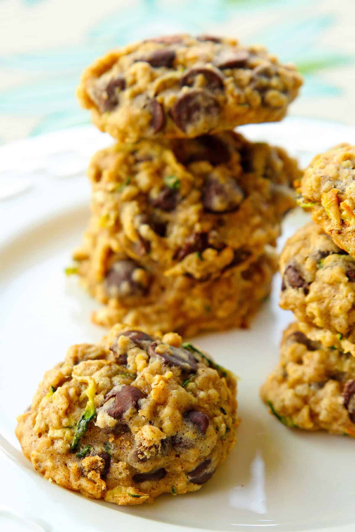 a stack of oatmeal zucchini cookies on a white plate