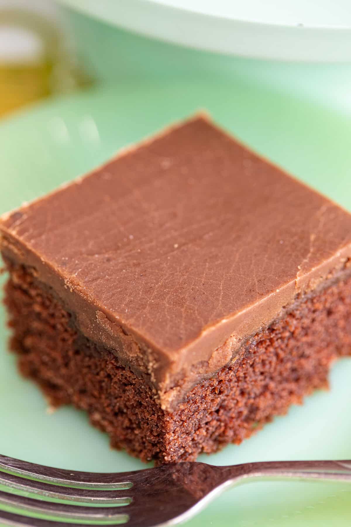 chocolate fudge frosting on top of a sheet cake
