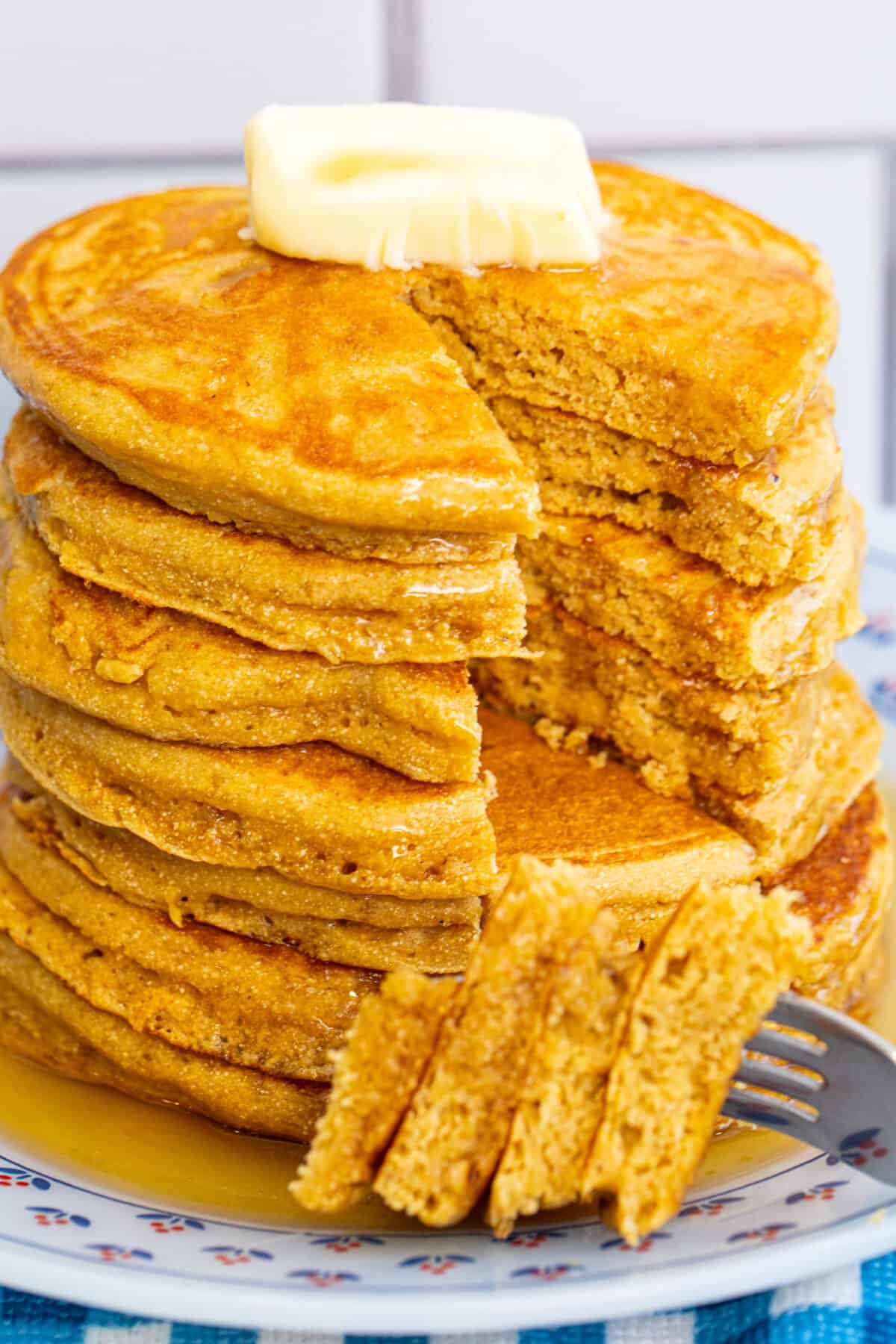a sliced stack of cornmeal pancakes