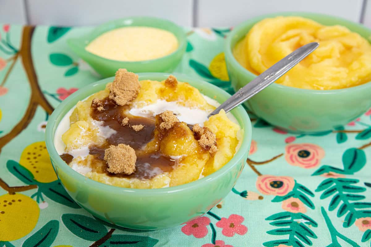 Creamy cornmeal porridge served warm with a sprinkle of cinnamon and nutmeg.