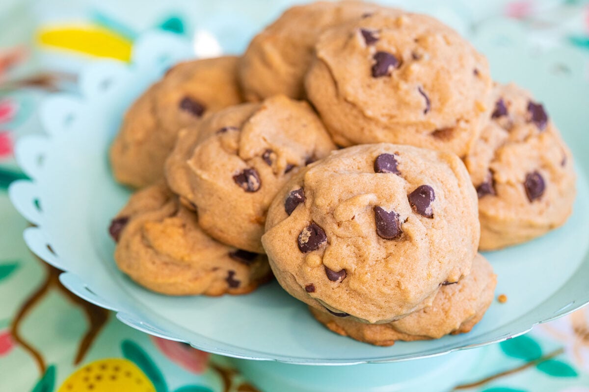 soft chocolate chip cookies on a turquoise platter