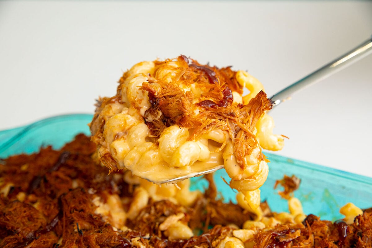 spoon of pulled pork mac and cheese