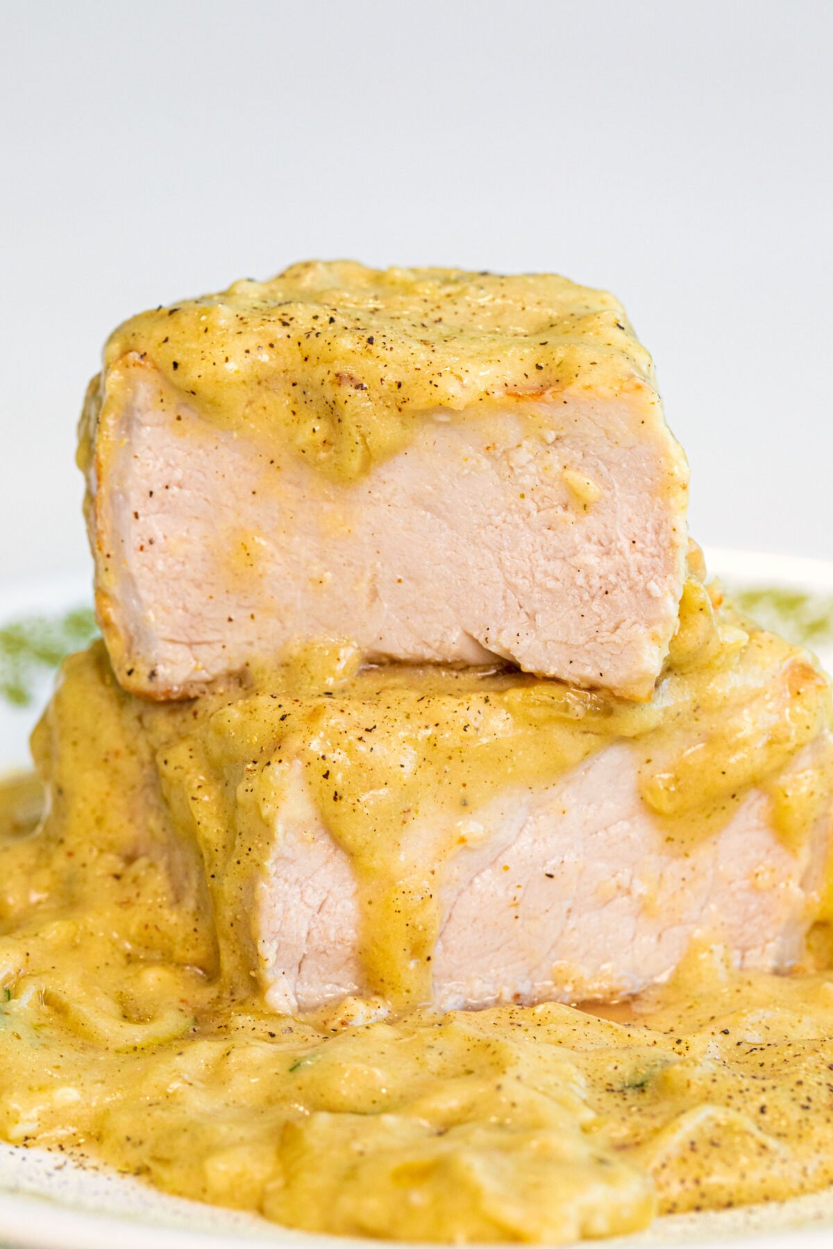 pork chops in sauce sliced and stacked