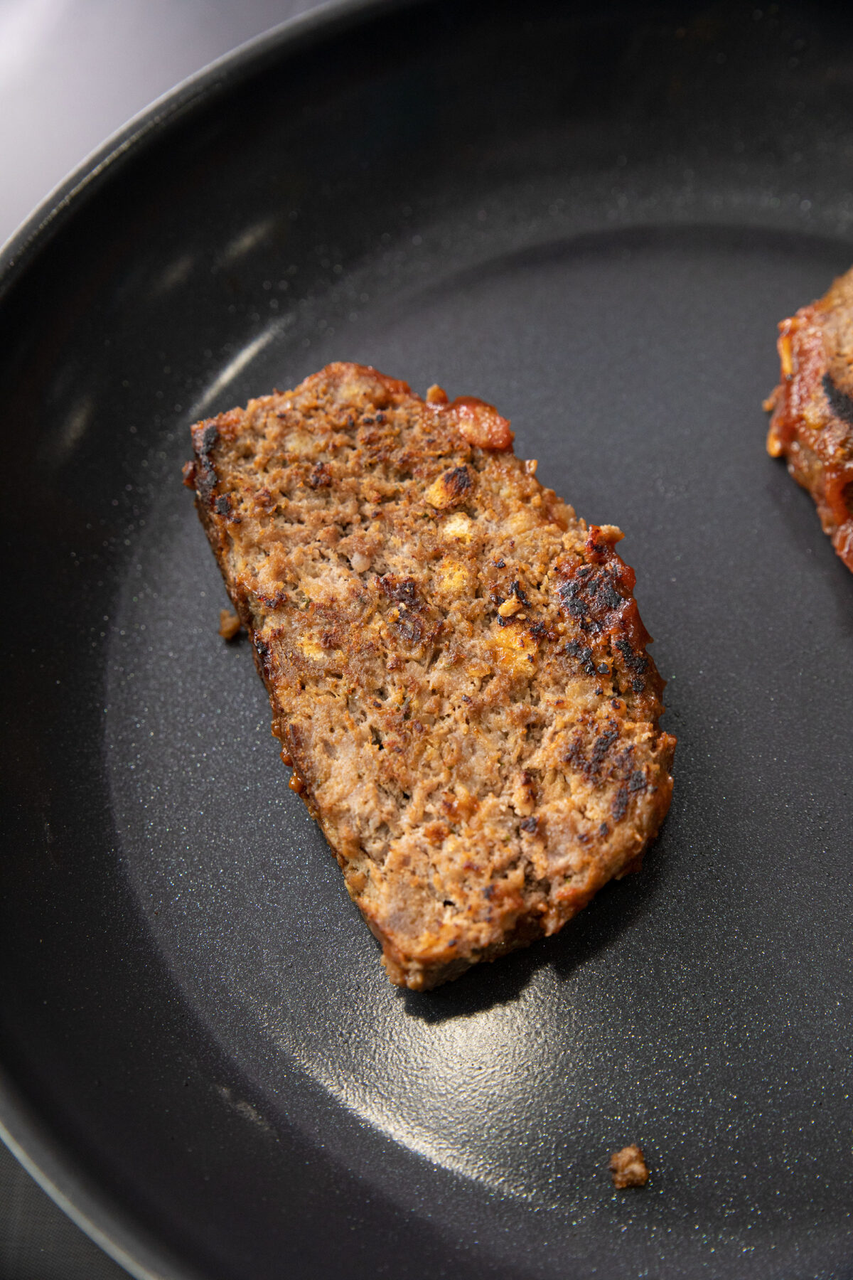 meatloaf being reheated in a pan (flipped)