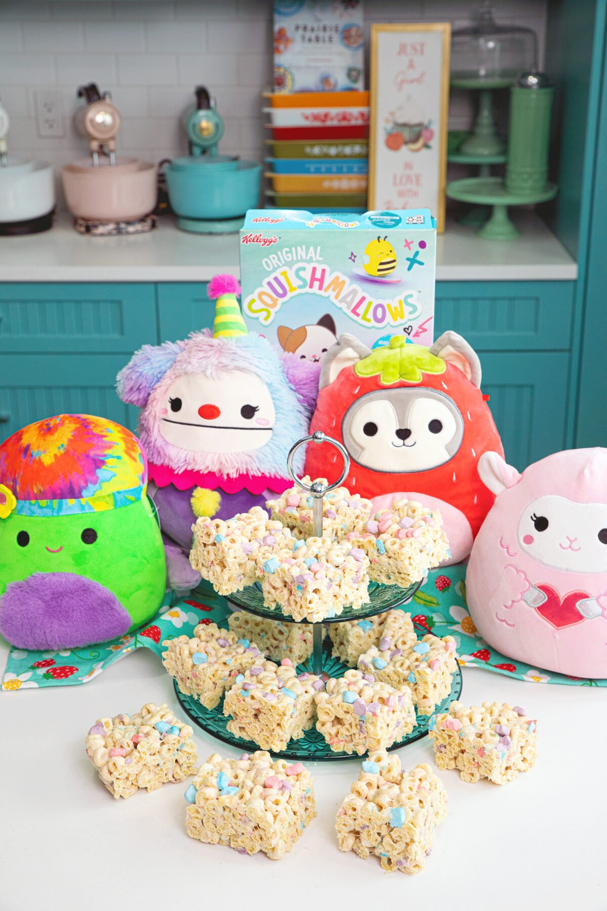a stack of Squishmallow bars and Squishmallows