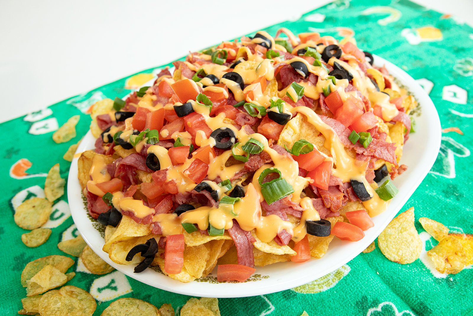 Crispy potato rounds loaded with cheese, bacon, and toppings.