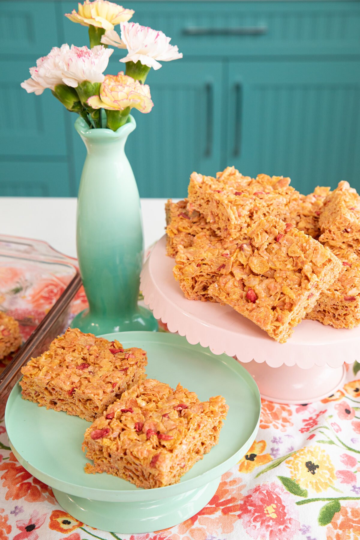  strawberry milkshake cereal bars on a pink platter