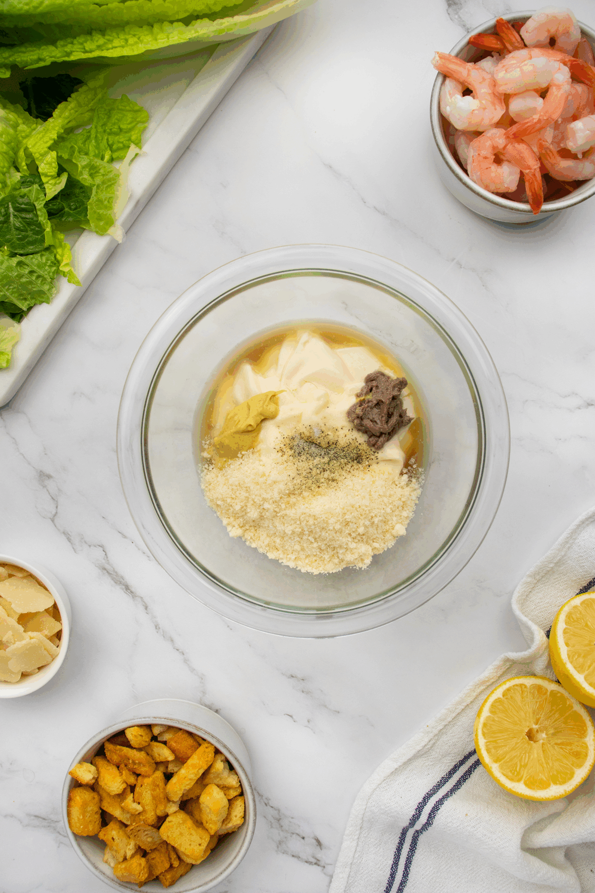 A bowl of food on a marble surface.