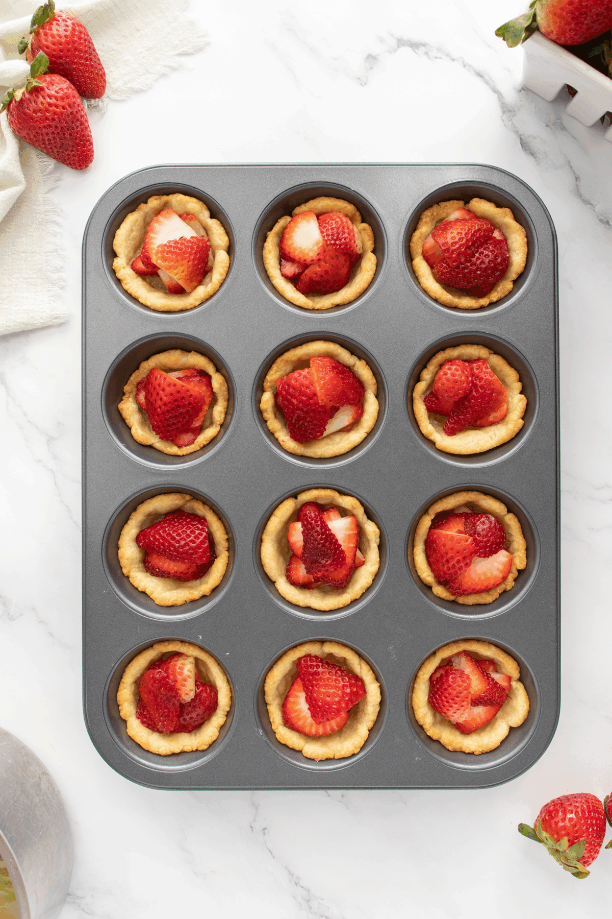 A tray of fruit tarts.