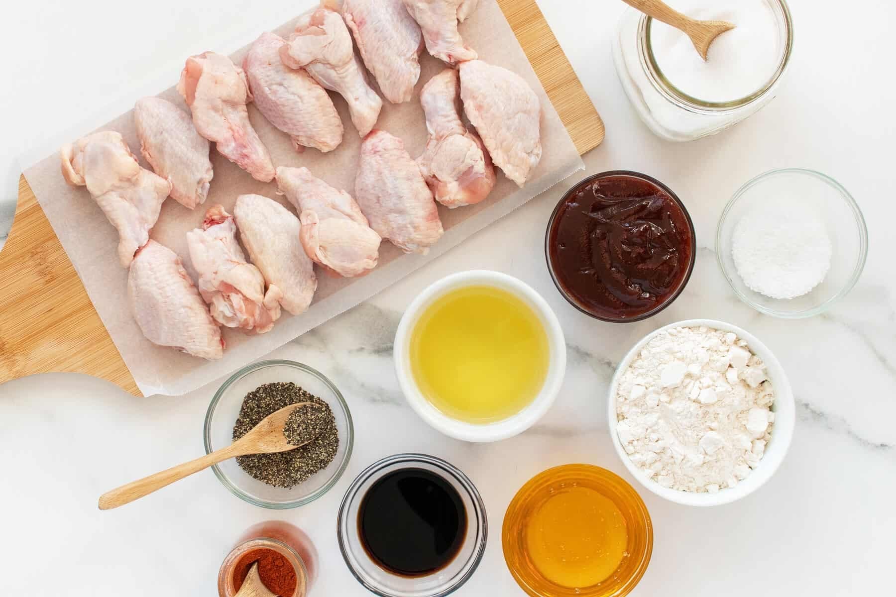 Honey BBQ wings ingredients in small white bowls